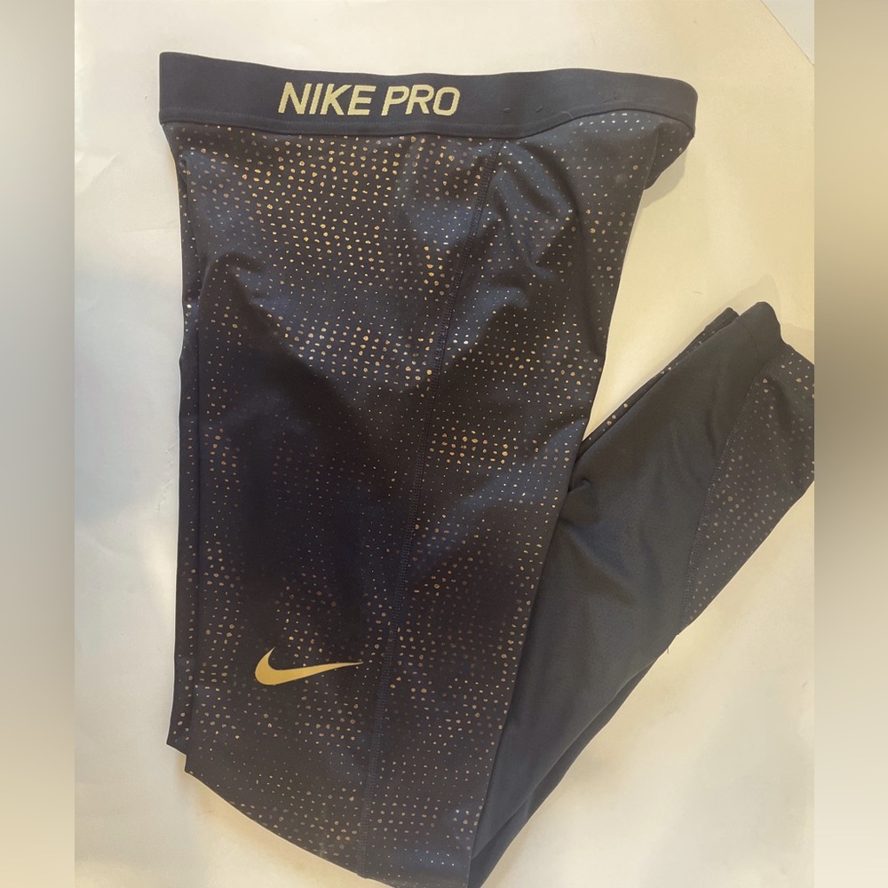 Nike Pro Gold Swoosh and Dots women’s M
